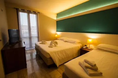 Letto o letti in una camera di Hotel Elefante