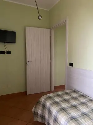 Letto o letti in una camera di B&B Molinetto