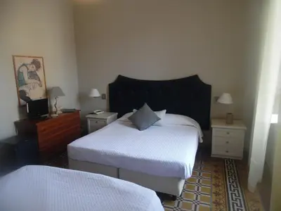 Letto o letti in una camera di Hotel Miramare