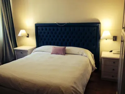 Letto o letti in una camera di Hotel Miramare