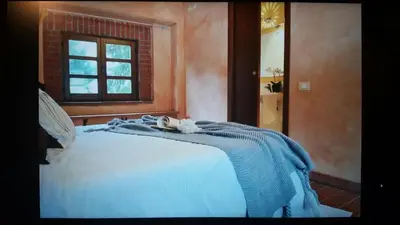Letto o letti in una camera di La cascina di Anna