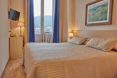 Letto o letti in una camera di Albergo Celeste