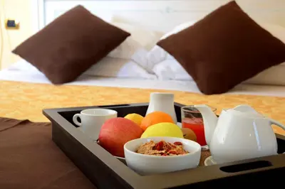 Letto o letti in una camera di Albergo Dimora Storica Antica Hostelleria