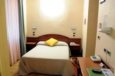 Letto o letti in una camera di Hotel Button