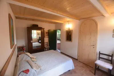 Letto o letti in una camera di Casa di Dino alla Brusa