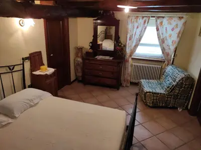 Letto o letti in una camera di Agriturismo Alpi