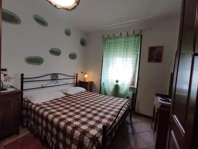Letto o letti in una camera di Agriturismo Alpi
