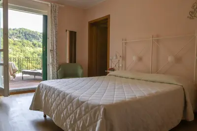 Letto o letti in una camera di Cà Del Moro Resort & SPA