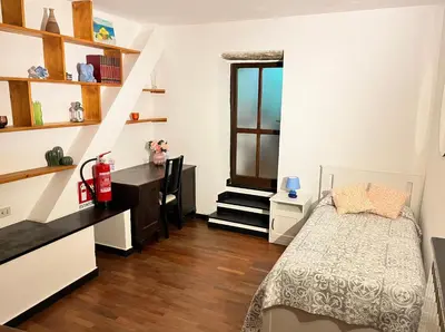 Letto o letti in una camera di Casa Alba