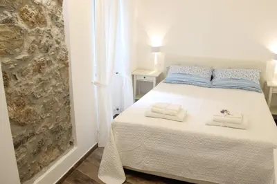 Letto o letti in una camera di Casa Maiò