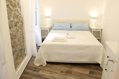 Letto o letti in una camera di Casa Maiò