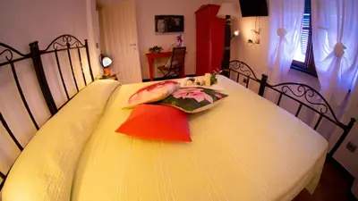 Letto o letti in una camera di Rooms and Breakfast da Carla
