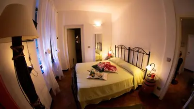 Letto o letti in una camera di Rooms and Breakfast da Carla