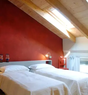 Letto o letti in una camera di Corte Mondina