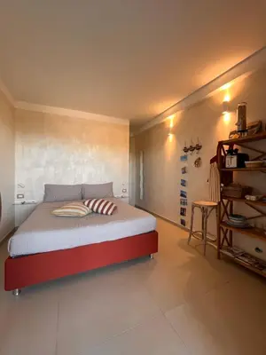 Letto o letti in una camera di Collimare Rooms & Sailing near 5 Terre