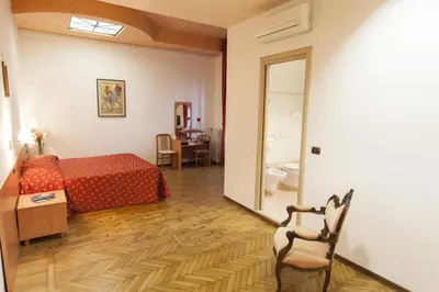 Letto o letti in una camera di Hotel Principe