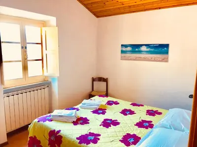 Letto o letti in una camera di La vecchia canonica