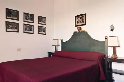 Letto o letti in una camera di Castello Malaspina di Fosdinovo