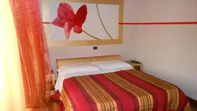Letto o letti in una camera di Agriturismo Corte Carnevale