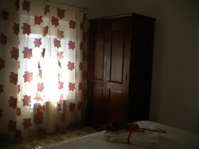 Letto o letti in una camera di casetta del nonno bis