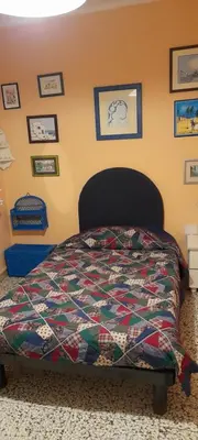 Letto o letti in una camera di Casa sotto il Castello