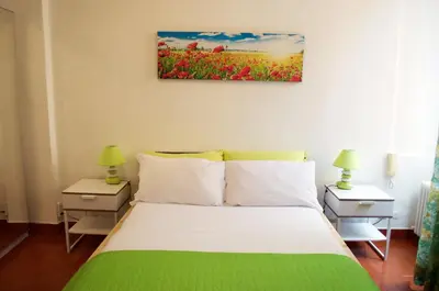 Letto o letti in una camera di Giramondo