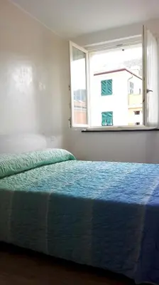 Letto o letti in una camera di Gloria House