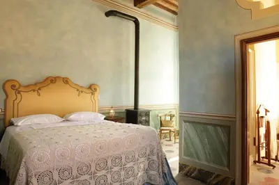 Letto o letti in una camera di Podere Pradarolo