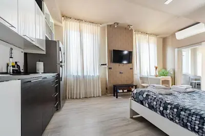 Letto o letti in una camera di Appartamenti ModeRna - Charme & Relax in centro