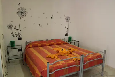 Letto o letti in una camera di Elicrim