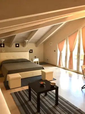 Area soggiorno di RESIDENZA VIRGILIANA SUITE con terrazza-Centro Storico