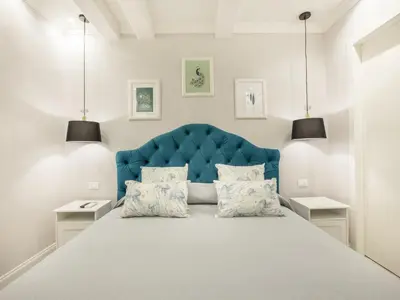 Letto o letti in una camera di A cà da Alba Rooms