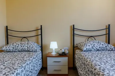 Letto o letti in una camera di Locanda con cucina Il Tornado