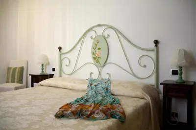 Letto o letti in una camera di L'Antica Pieve Bed & Breakfast