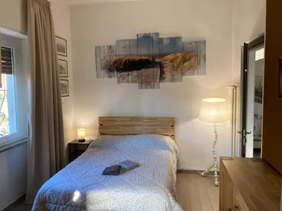 Letto o letti in una camera di Il Gelsomino Garden Suite
