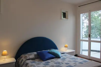 Letto o letti in una camera di villa panoramica