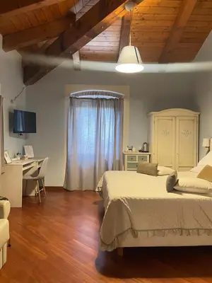 Letto o letti in una camera di Locanda De Banchieri