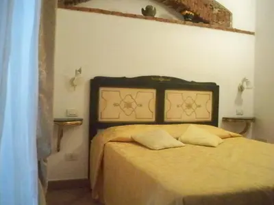 Letto o letti in una camera di La Dolce Vita