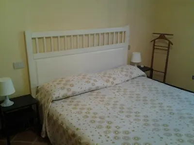 Letto o letti in una camera di Casina Volamerlo