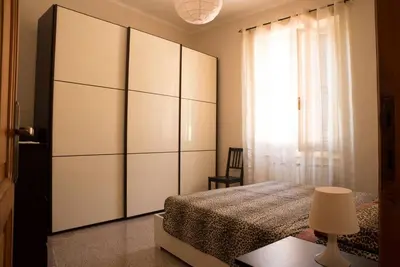 Letto o letti in una camera di Casa della Posta