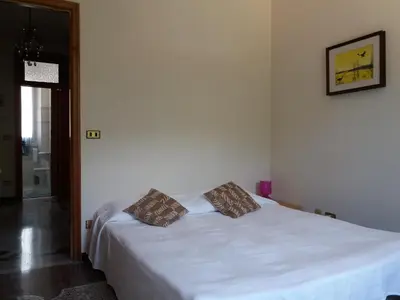 Letto o letti in una camera di Casa della Posta