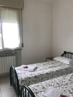 Letto o letti in una camera di Residence Mariele