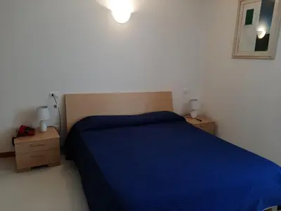 Letto o letti in una camera di Hotel Residence Mondial