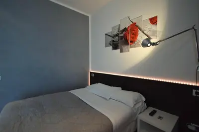 Letto o letti in una camera di Hotel Mantova Residence