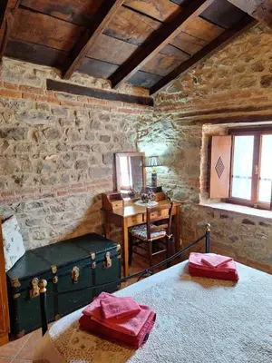 Letto o letti in una camera di Agriturismo Ristoro del Cavaliere
