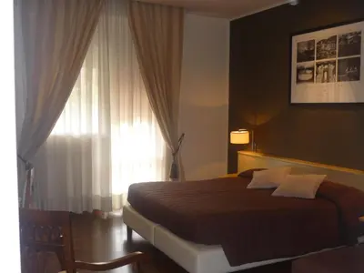 Letto o letti in una camera di Hotel Ancora Riviera