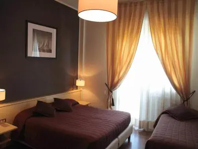 Letto o letti in una camera di Hotel Ancora Riviera