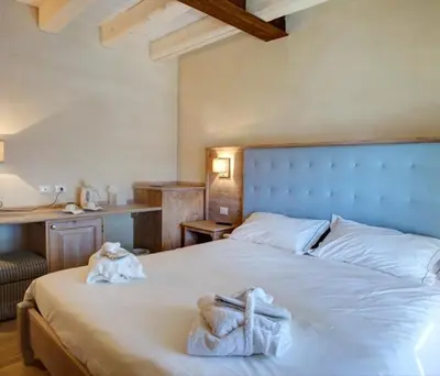 Letto o letti in una camera di Agriturismo Costa di Faraggiana