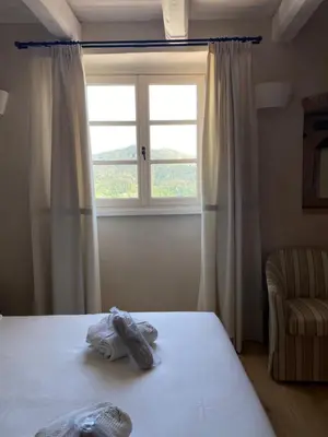 Letto o letti in una camera di Agriturismo Costa di Faraggiana