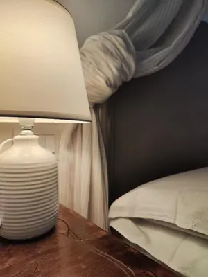 Letto o letti in una camera di Garda Relais Antica Romelia